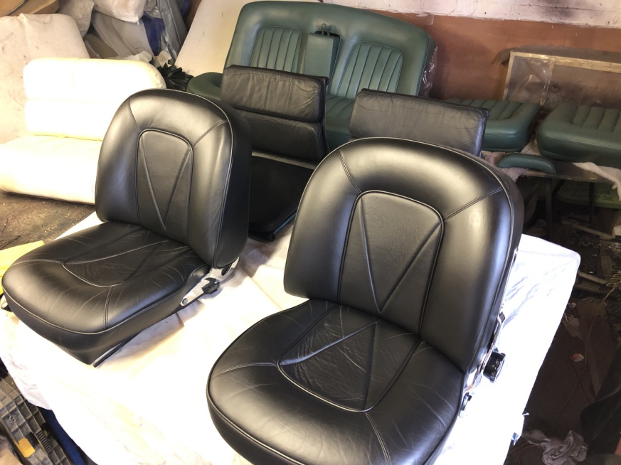 Leather repair and restoration work for the workshop in Theale, Reading, Berkshire. Aston Martin, Rolls Royce, Charles Eames, Captains Seat